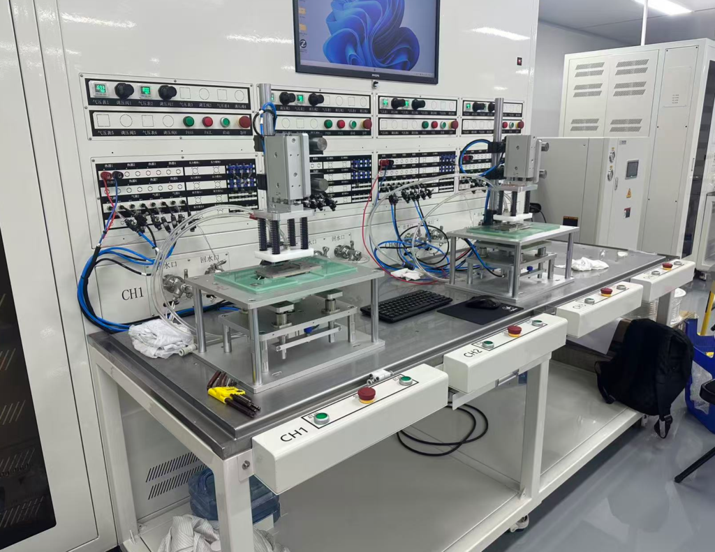 Cold Plate Test Stations in Cleanroom Rows of cold plate performance test stations with quick connector water loops in the cleanroom